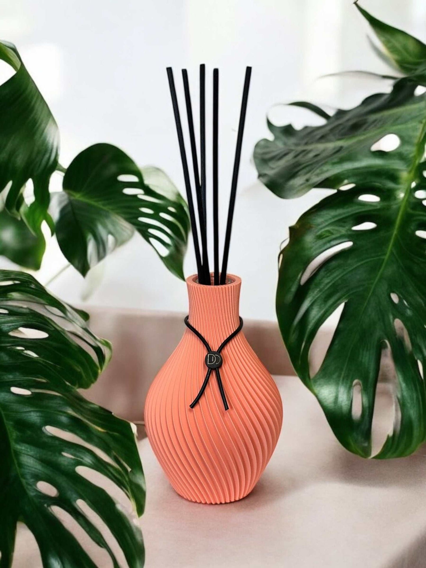 Elegant amphora-shaped fragrance diffuser with artistic design, adding sophistication to your interior.