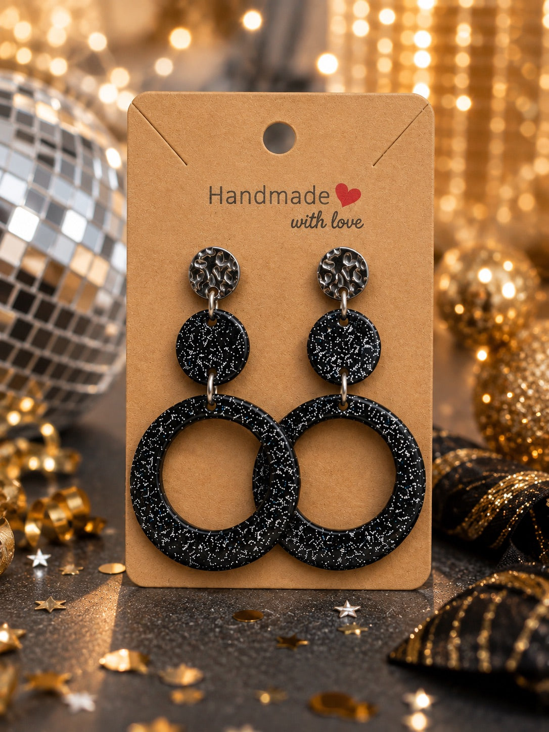 Boucles d’oreilles Dualis Pailletées Nuit Étoilée – bijou noir pailleté à finition brillante