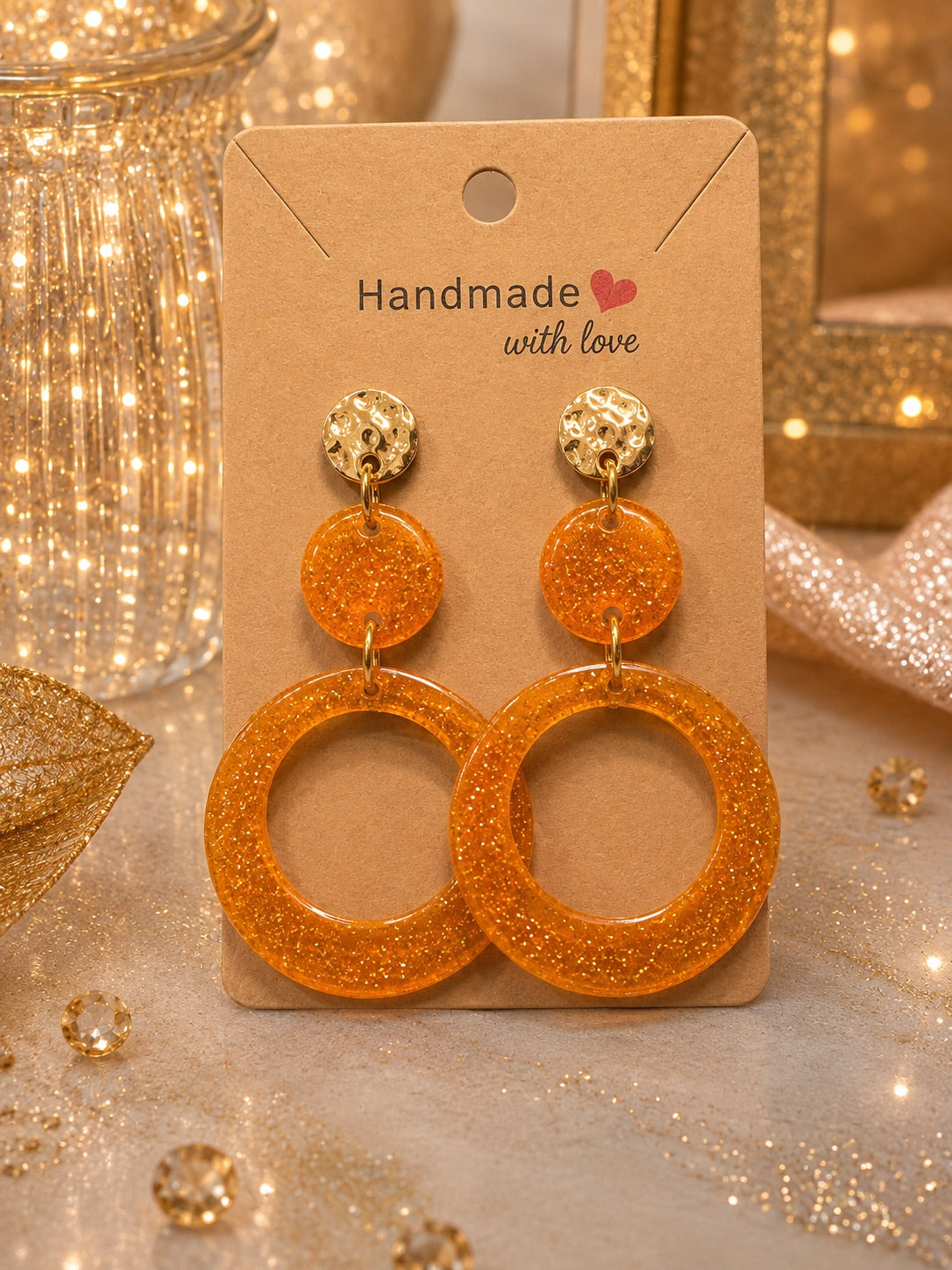 Boucles d’oreilles Dualis Pailletées Soleil d’Or – bijou doré pailleté en résine époxy