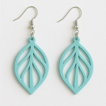 Boucles d’oreilles Feuille Végétale légères en PLA bleu turquoise, design ajouré et attaché argent 925, élégance naturelle.
